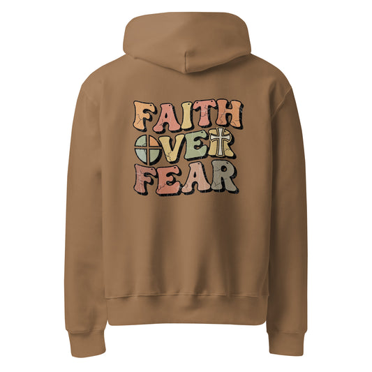 A brown hoodie with "Faith Over Fear" in colorful, distressed letters on the back.